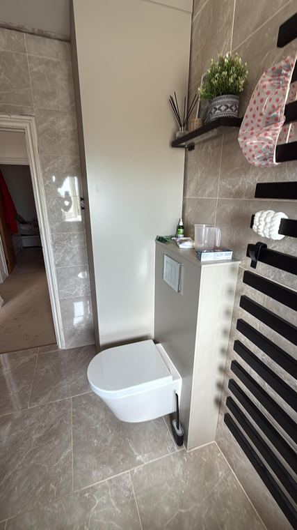 Towel radiator and open shelving detail