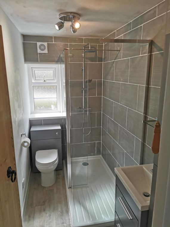 Fully tiled ensuite with a glass shower enclosure